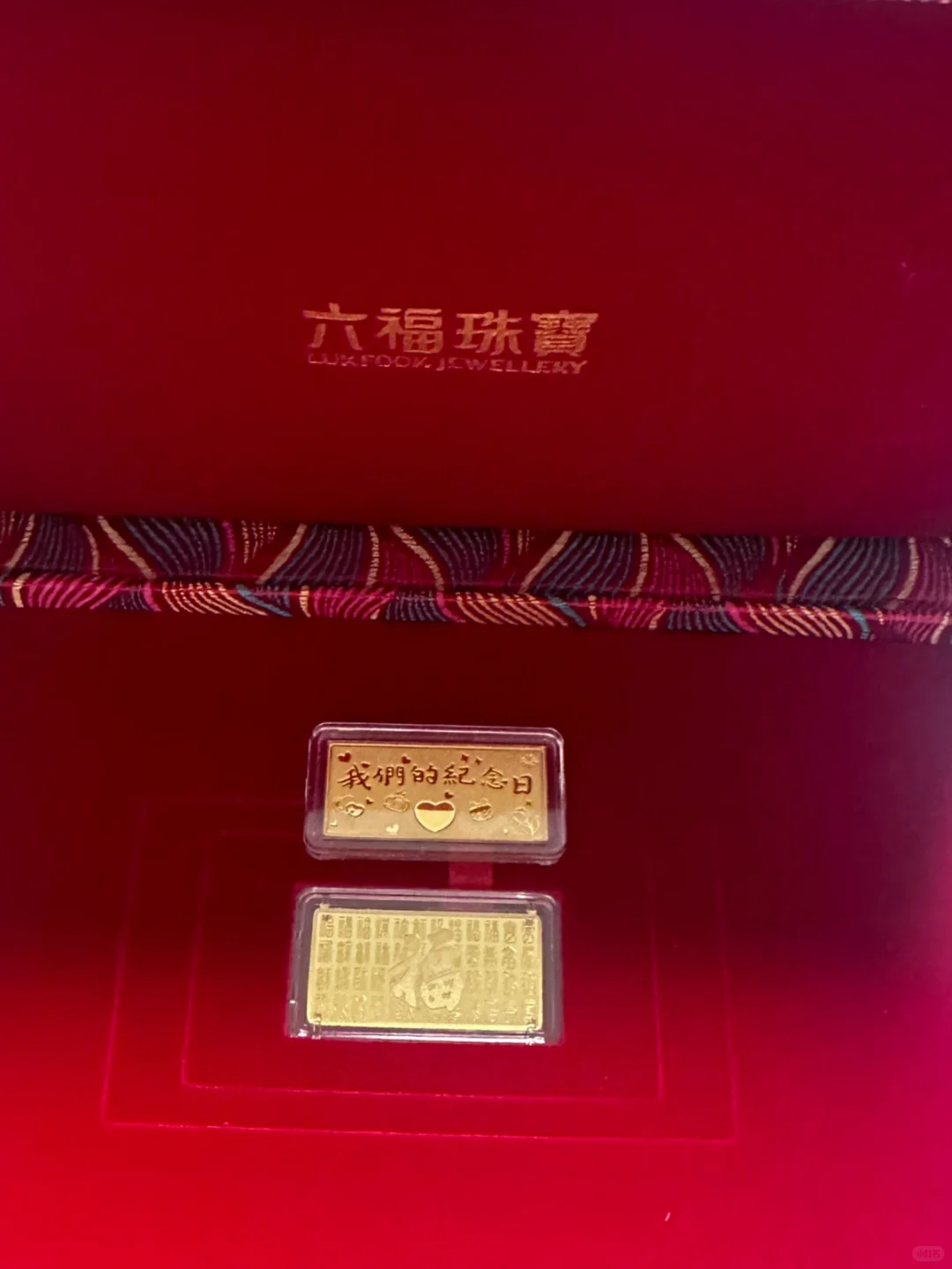 在黄金的最高点入了两块金条?