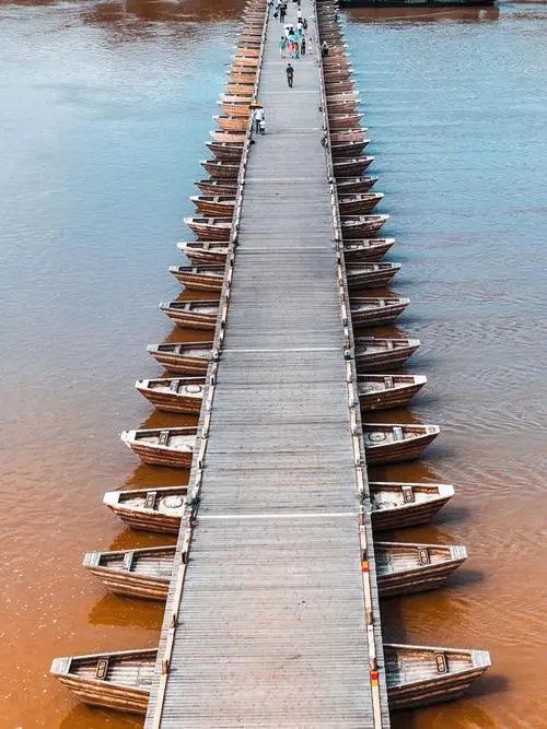 “总要去一趟赣州吧!吹吹古浮桥的晚风