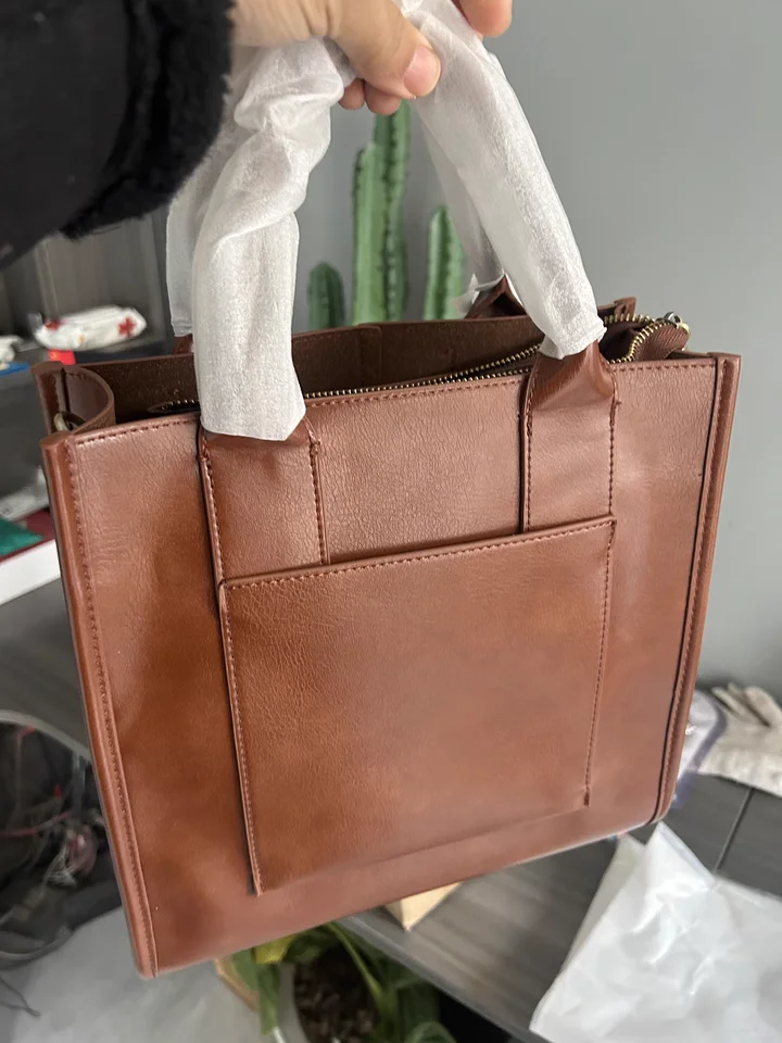 ?女生必备!落日黄大容量牛皮包?