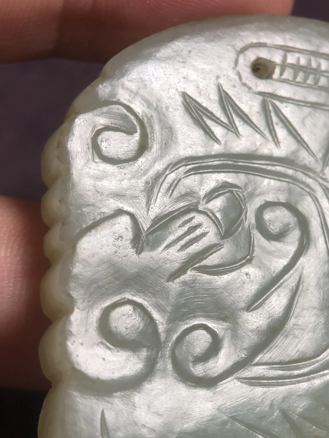 2004年天津文物展销会买的一块明代龙纹牌