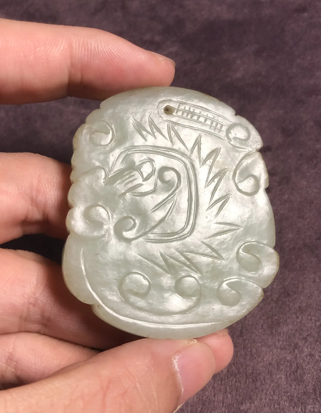 2004年天津文物展销会买的一块明代龙纹牌