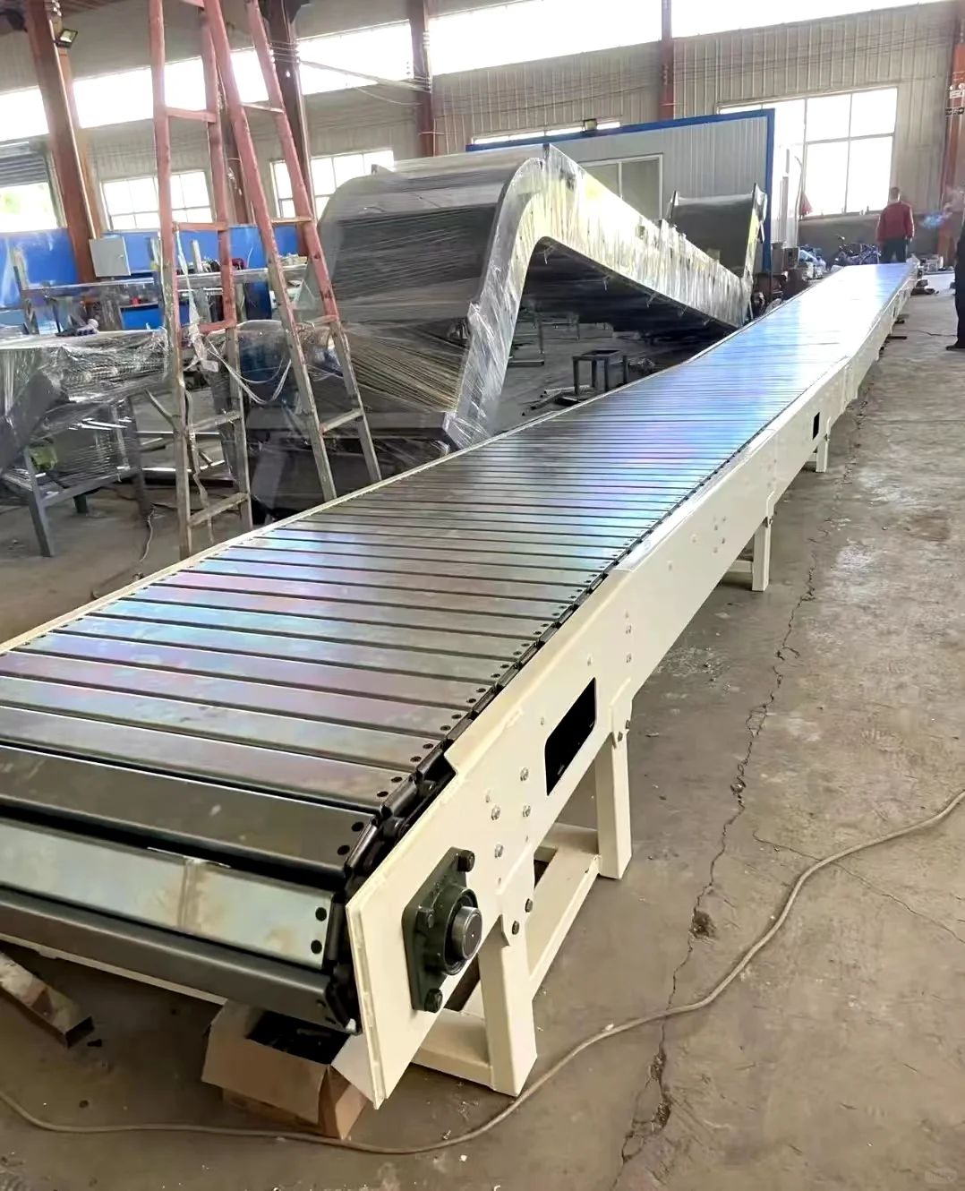 链板输送机的工作原理是什么?