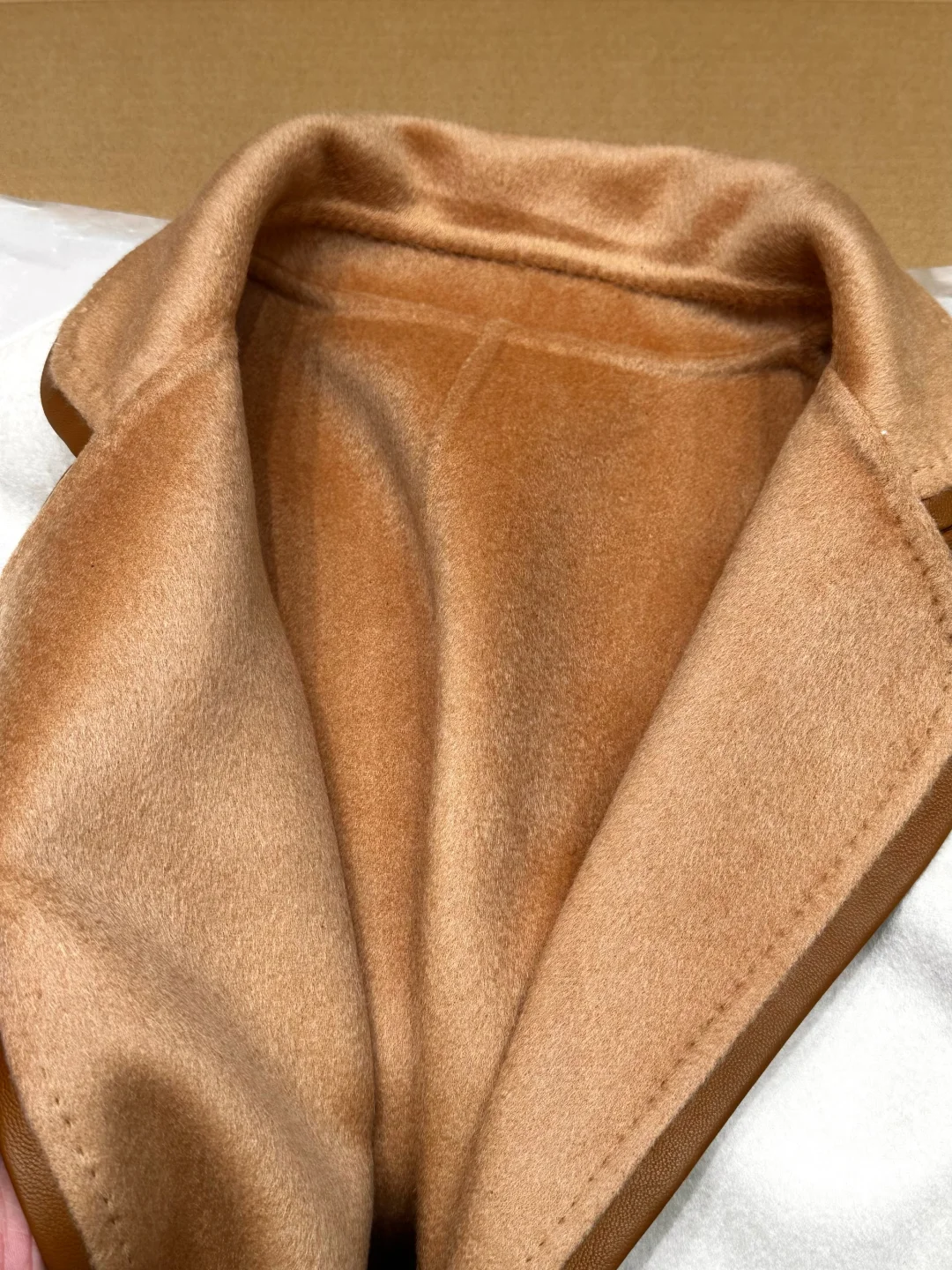 关于这件纯羊绒大衣 说点真实的数字