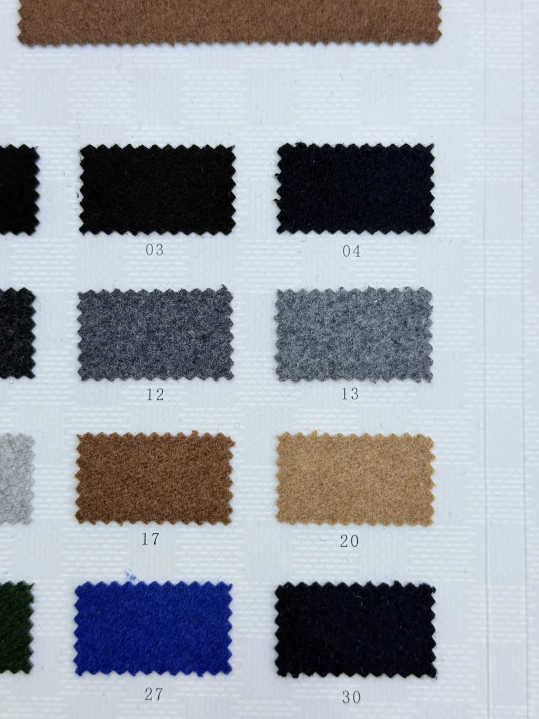 羊毛双面绒面料，细腻温暖的质感