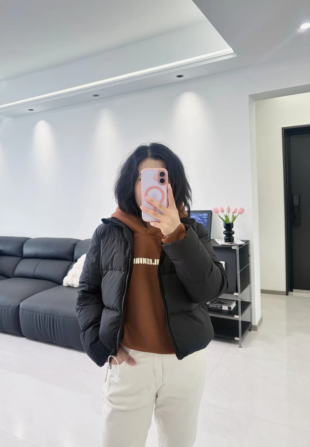 155/100黑色短款羽绒服的一衣多穿