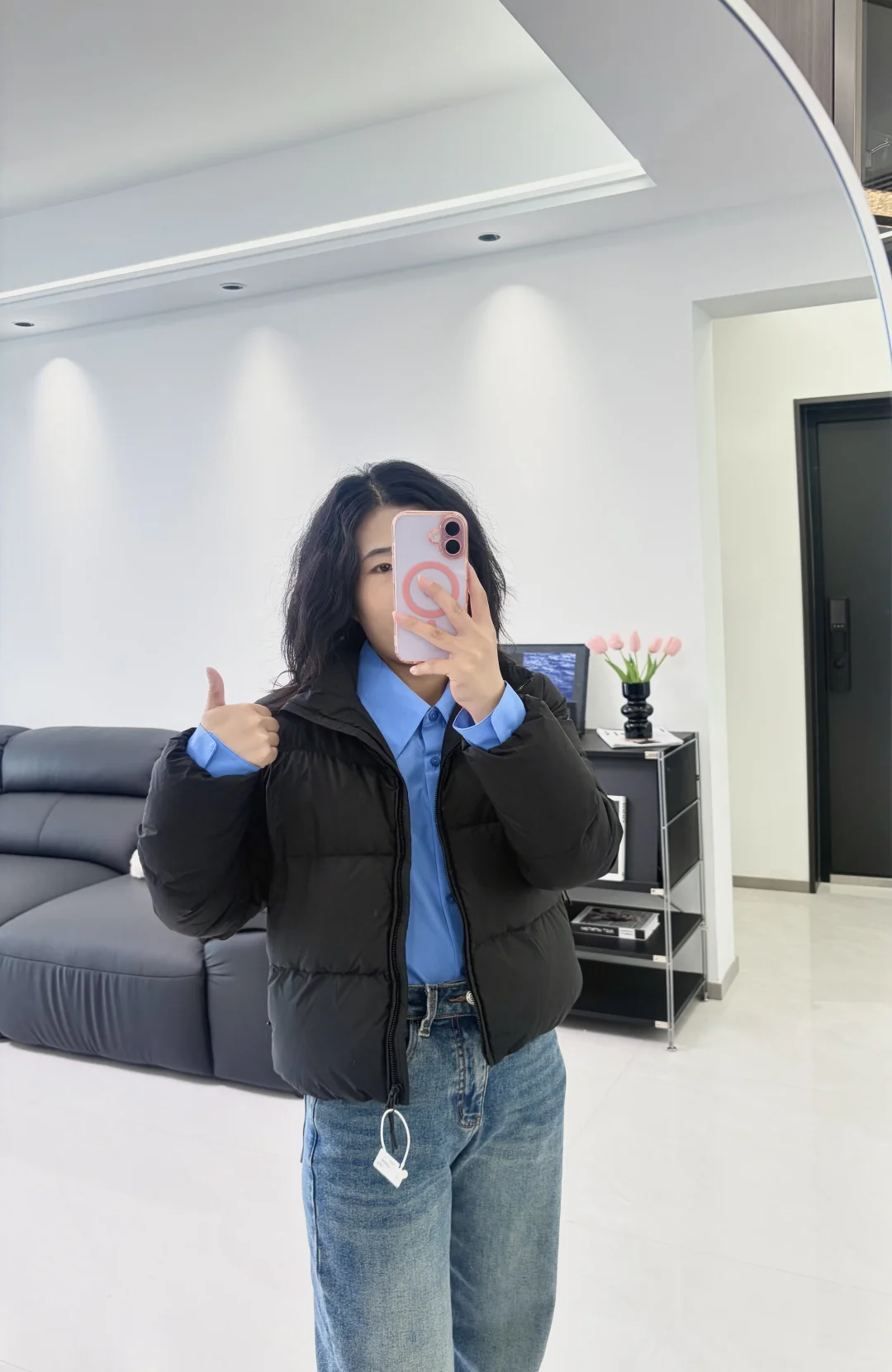 155/100黑色短款羽绒服的一衣多穿