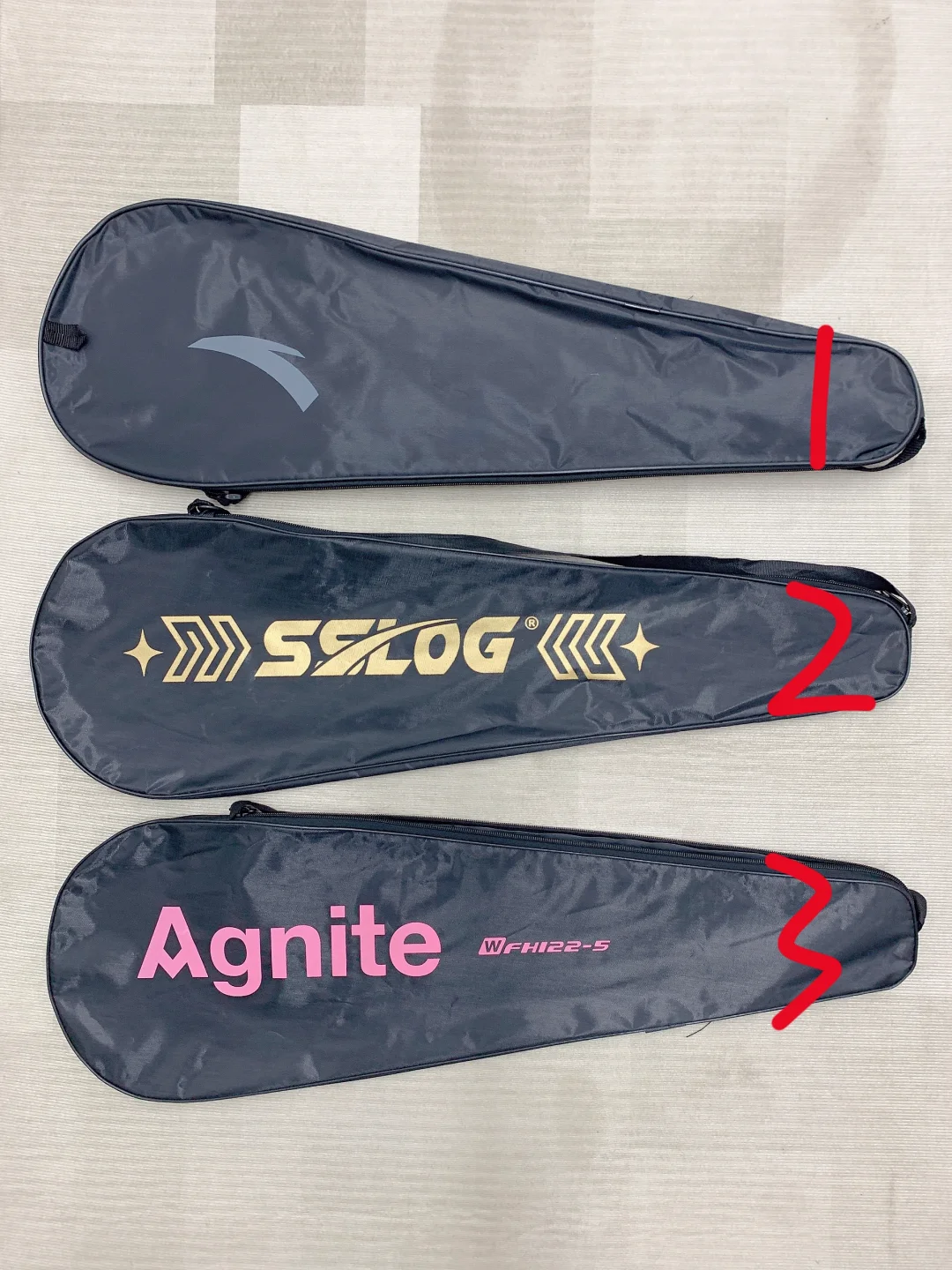 自费买下三把羽毛球拍，最后我选了..