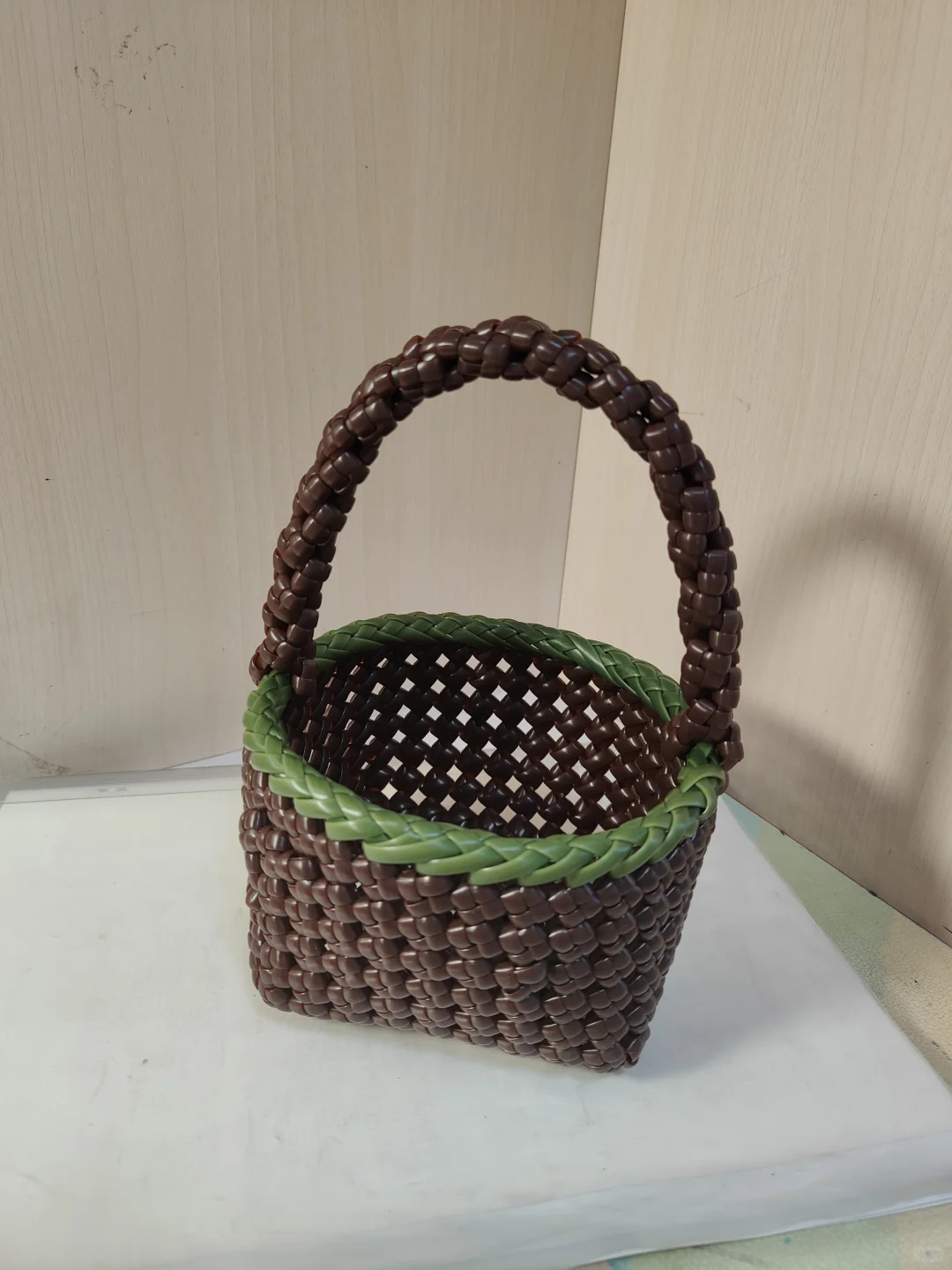 青草绿编织包?